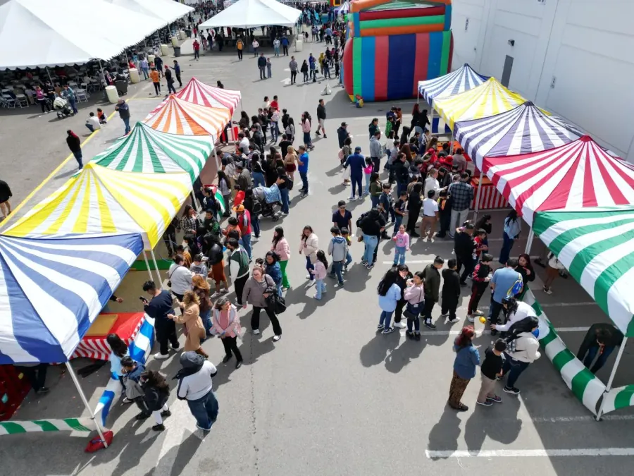 School carnival with striped booths and games