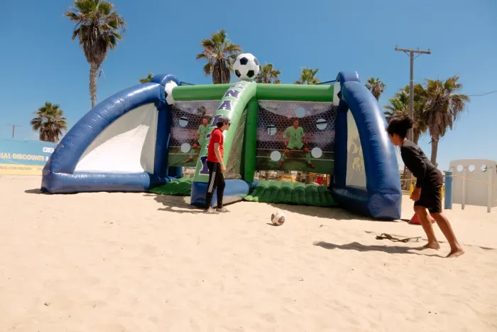 Birthday party carnival setup with inflatable jumper